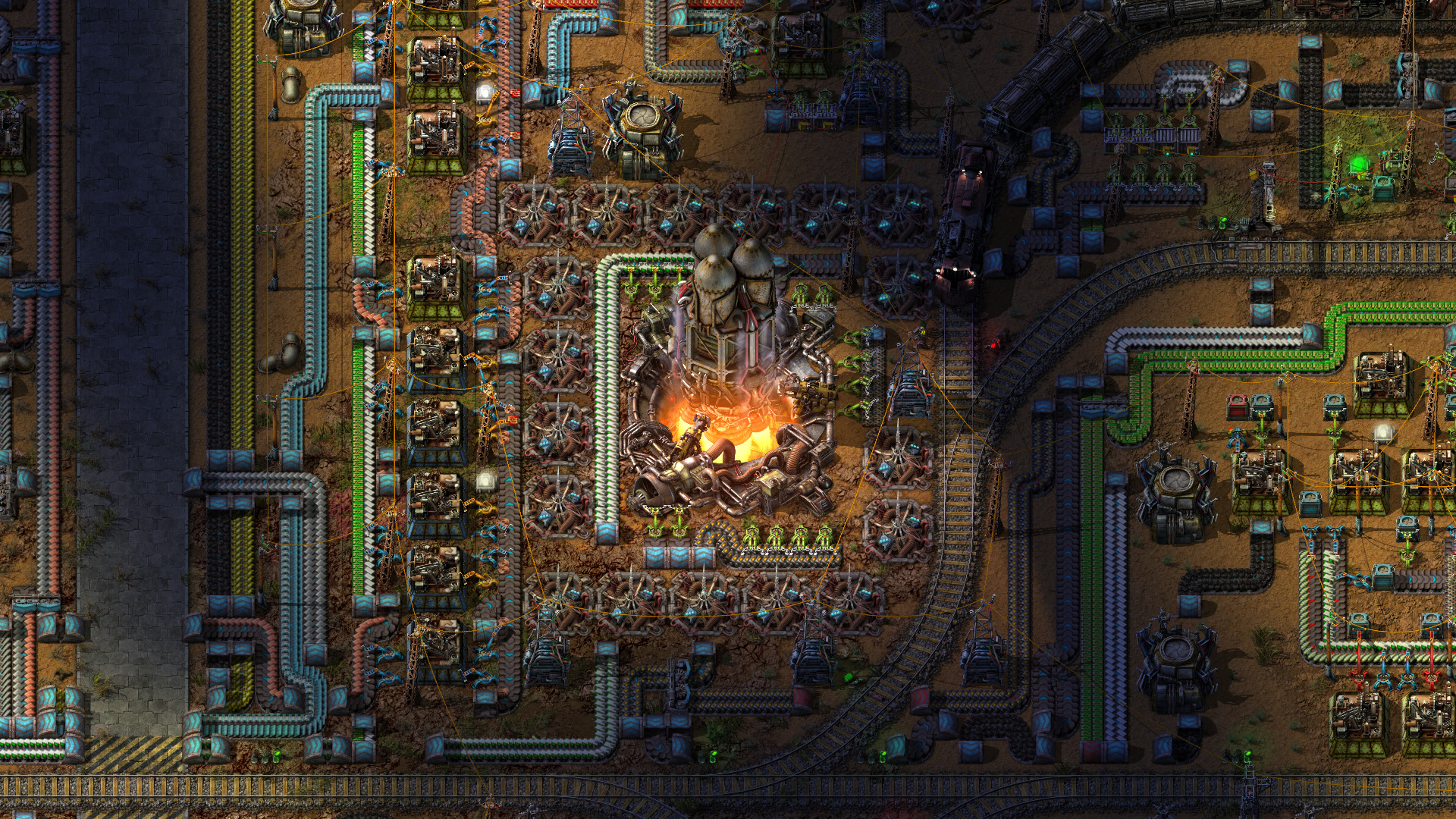 Factorio-Fabrik mit Raketensilo, Maschinen und Förderbändern